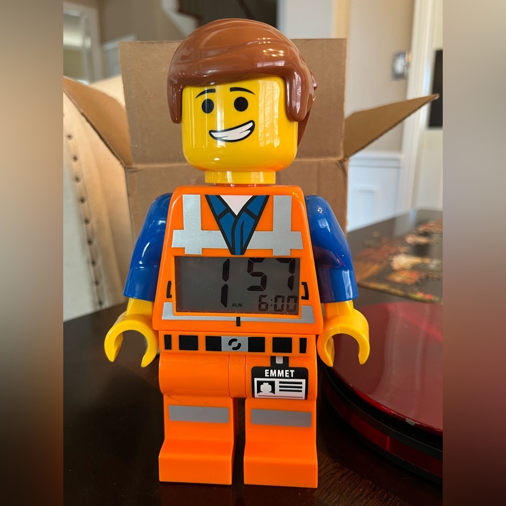 LEGO Emmett alarm clock. Arms and legs move for multiple positions.